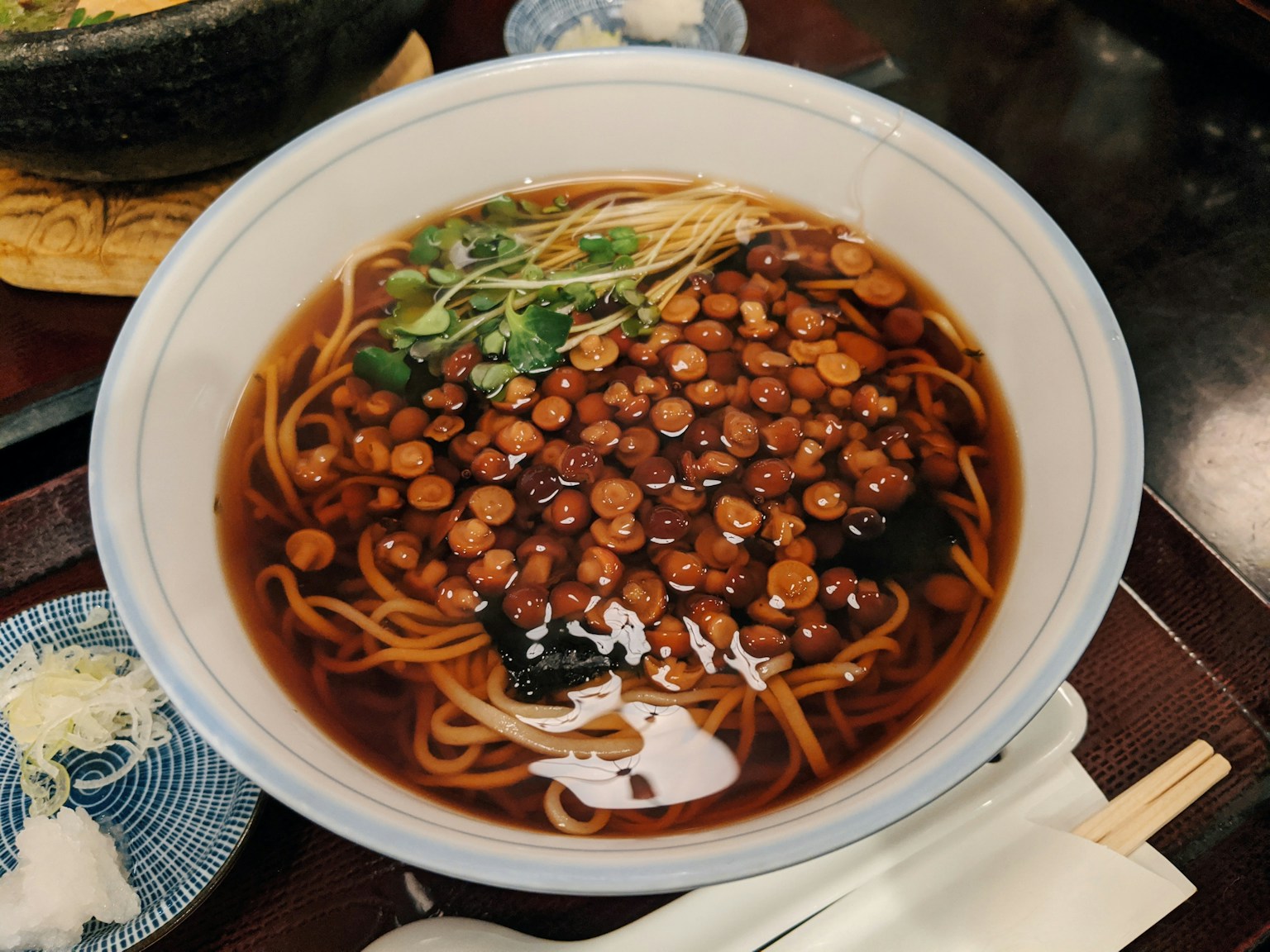 white ceramic bowl with brown soup (Photo by note thanun on Unsplash)