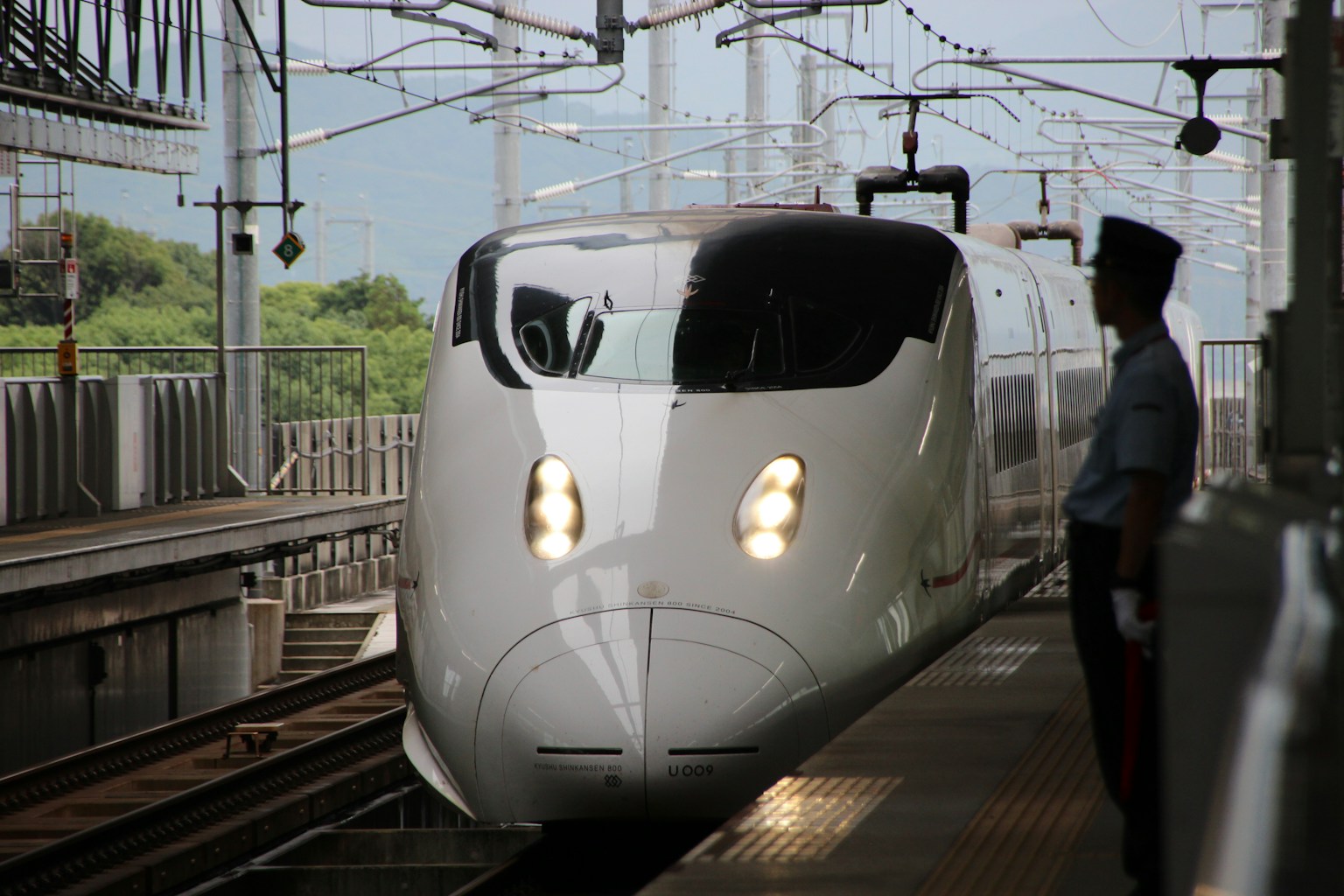 white and black train on rail (Photo by Rikku Sama on Unsplash)