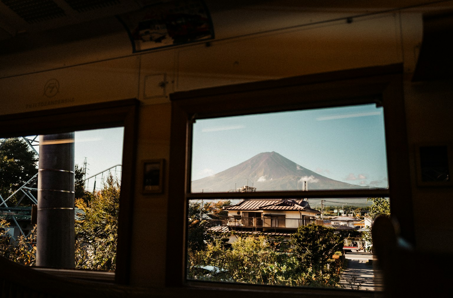 Mount fuji seen through a window. (Photo by Mario Scheibl on Unsplash)