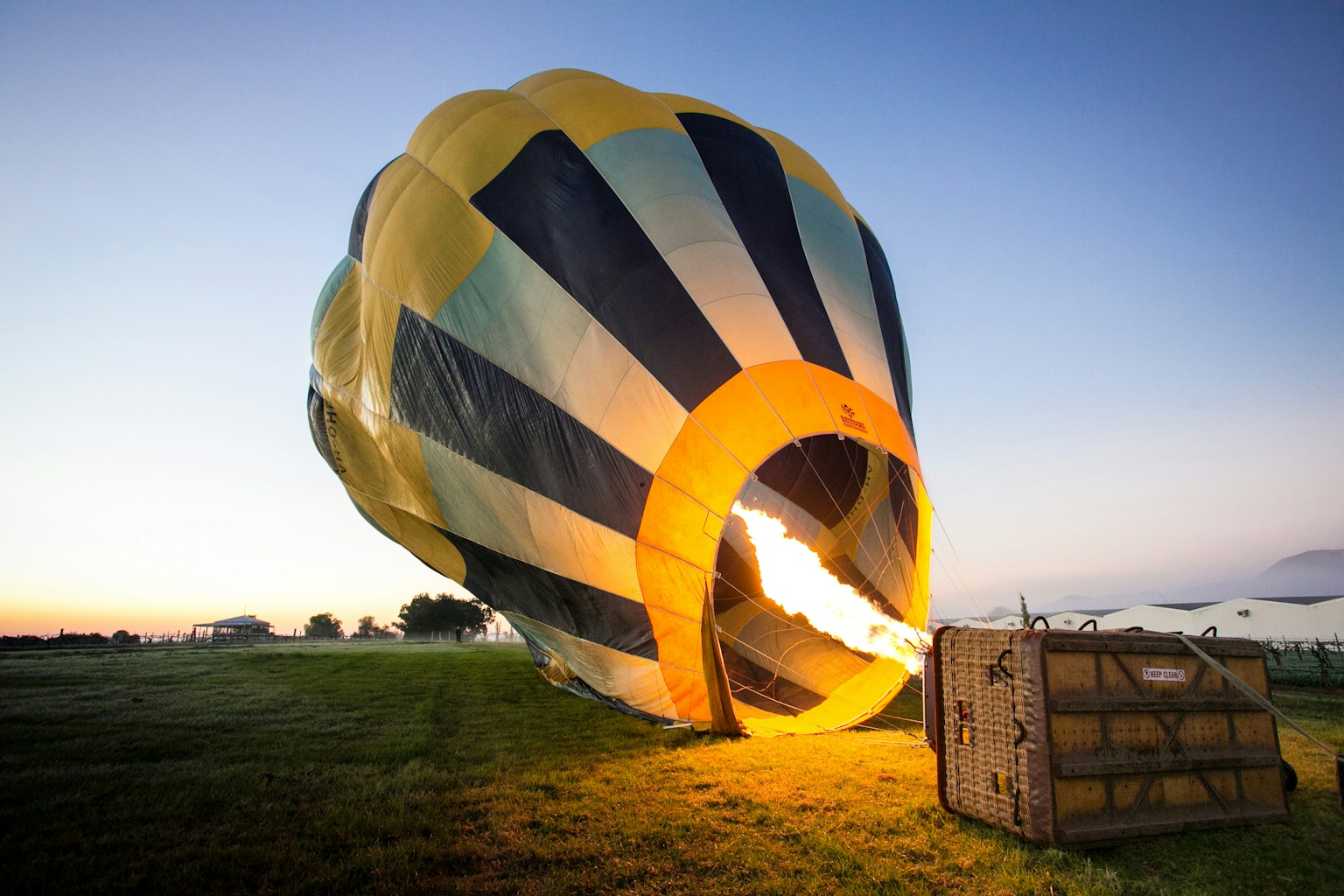 yellow and blue hot air balloon at daytime (Photo by Will O on Unsplash)