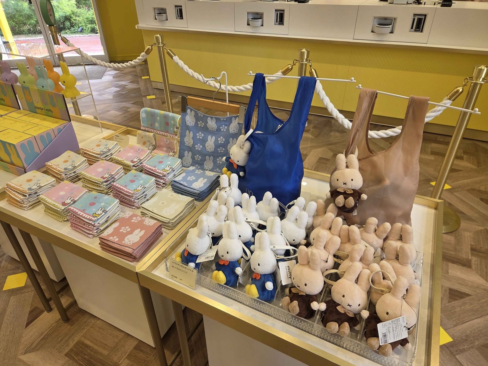 Miffy souvenir shop inside Huis Ten Bosch, with handkerchiefs, towels and plush eco bags on display