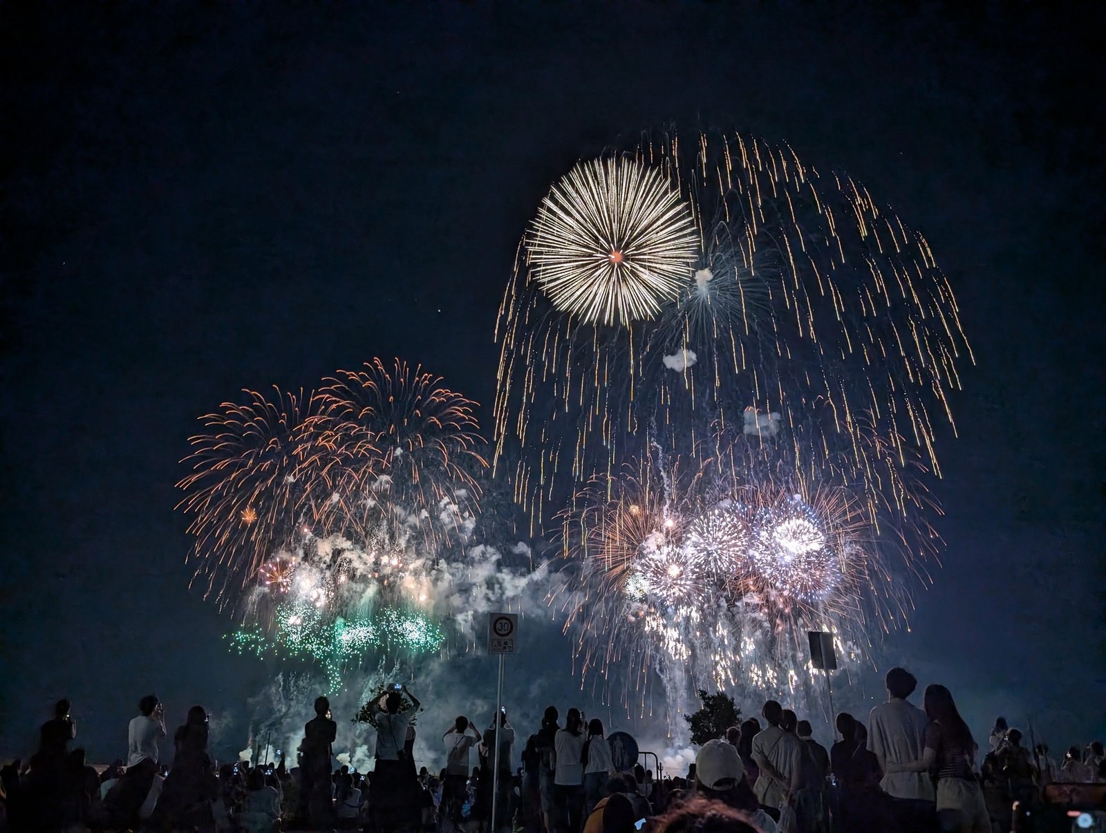 Summer fireworks festival crowd silhouettes in Fukuoka